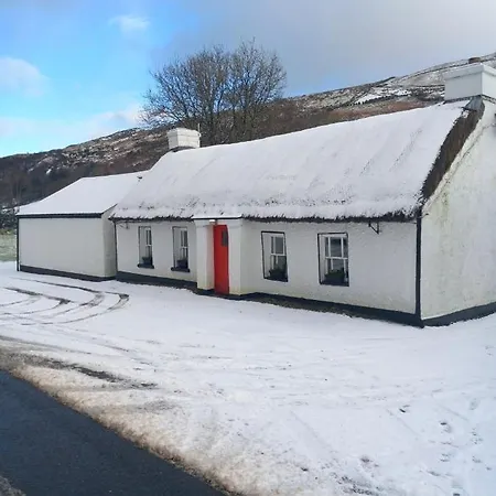 Semesterbostad Eddie's Thatched Roadside *